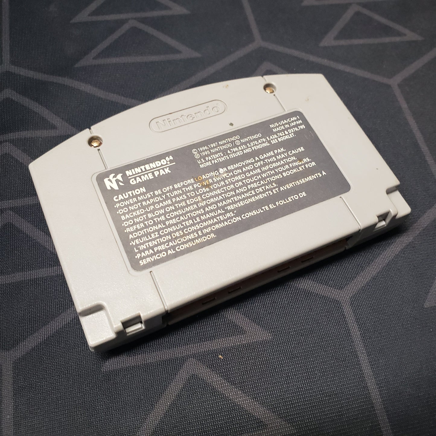Image shows the back of the cartridge for the video game Madden NFL 2000 for the Nintendo 64