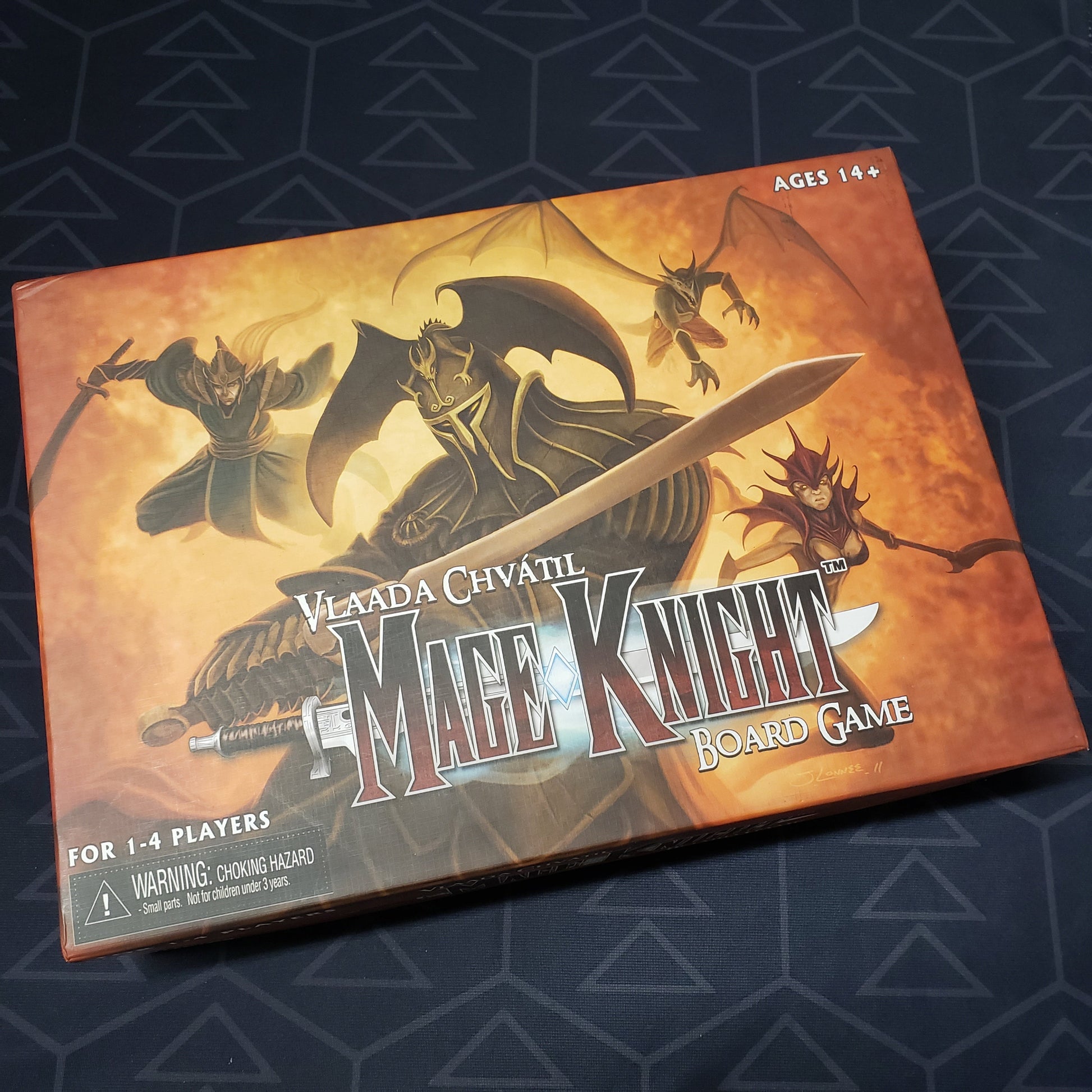 Image shows the front cover of the box for the Mage Knight Board Game