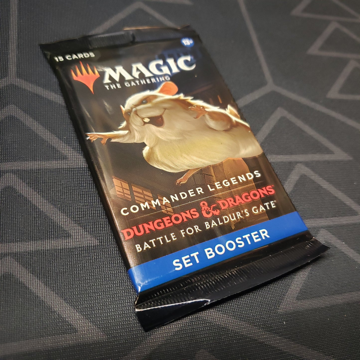 Image shows the front of the packaging of a Commander Legends: Battle for Baldur's Gate - Set Booster Pack for the card game Magic the Gathering