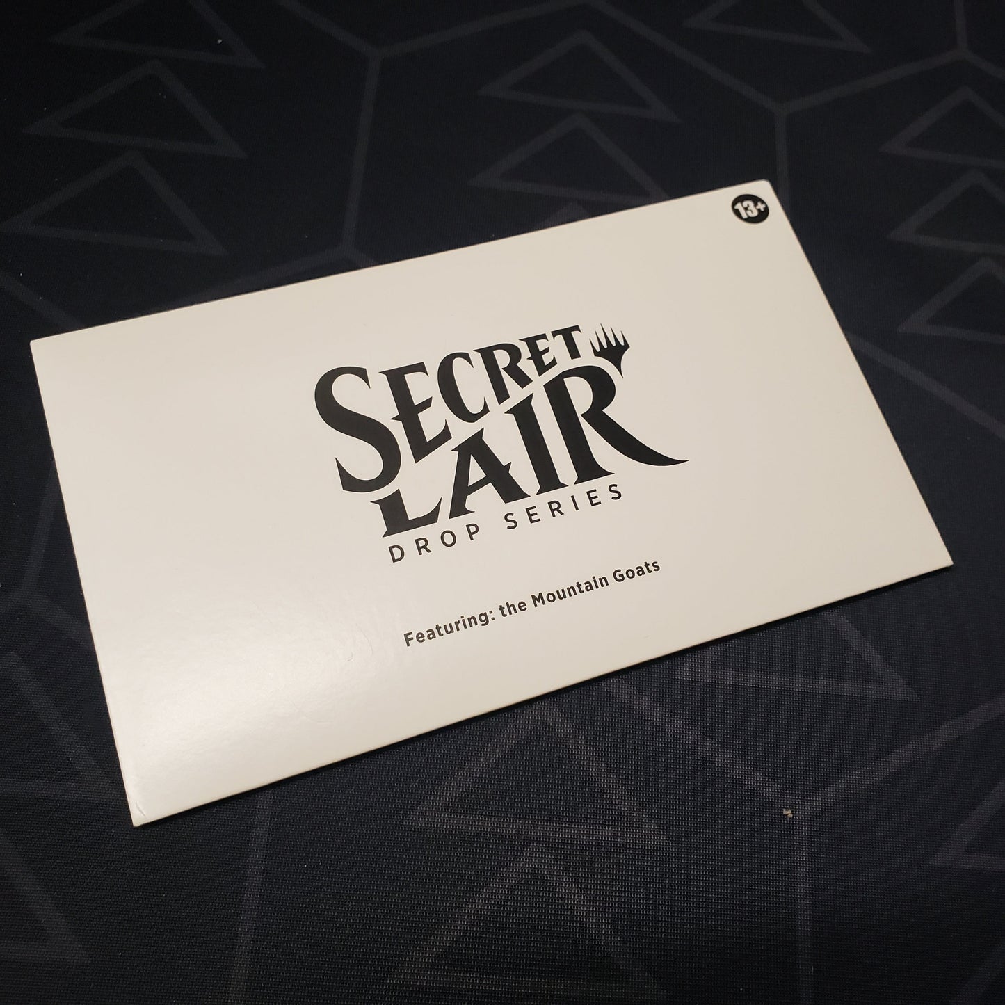 Image shows the front of the packaging for the Magic: Secret Lair Drop Series - The Mountain Goats set