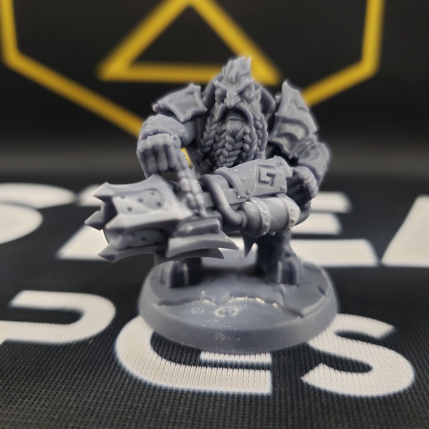 Image shows a 3D printed dwarven gunner gaming miniature