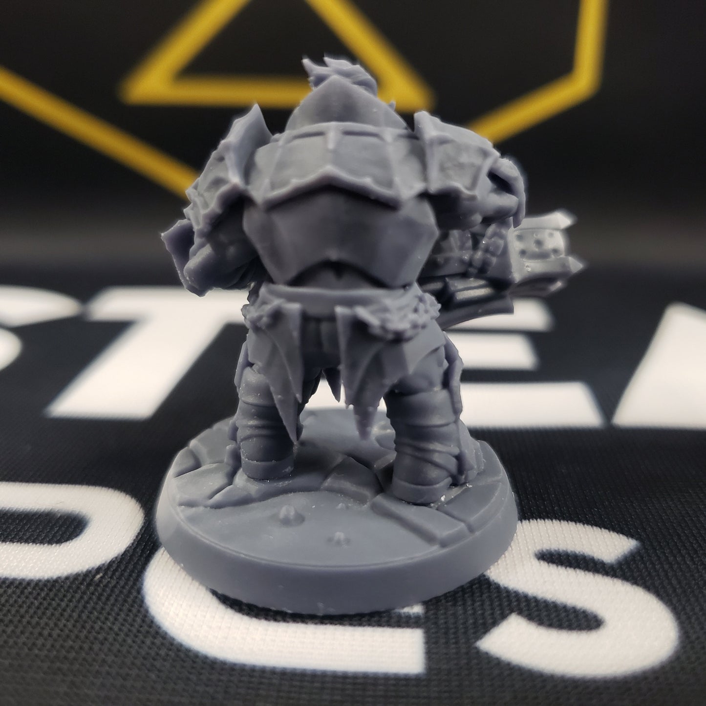 Image shows a 3D printed dwarven gunner gaming miniature