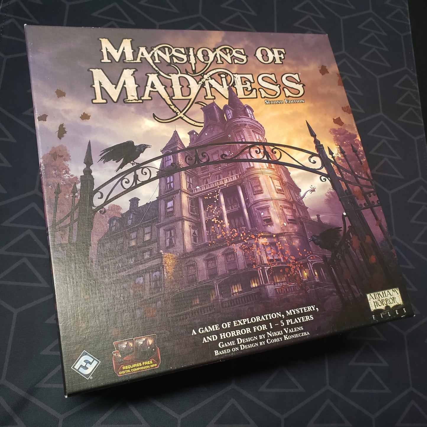 Image shows the front cover of the box of the Mansions of Madness (Second Edition) board game