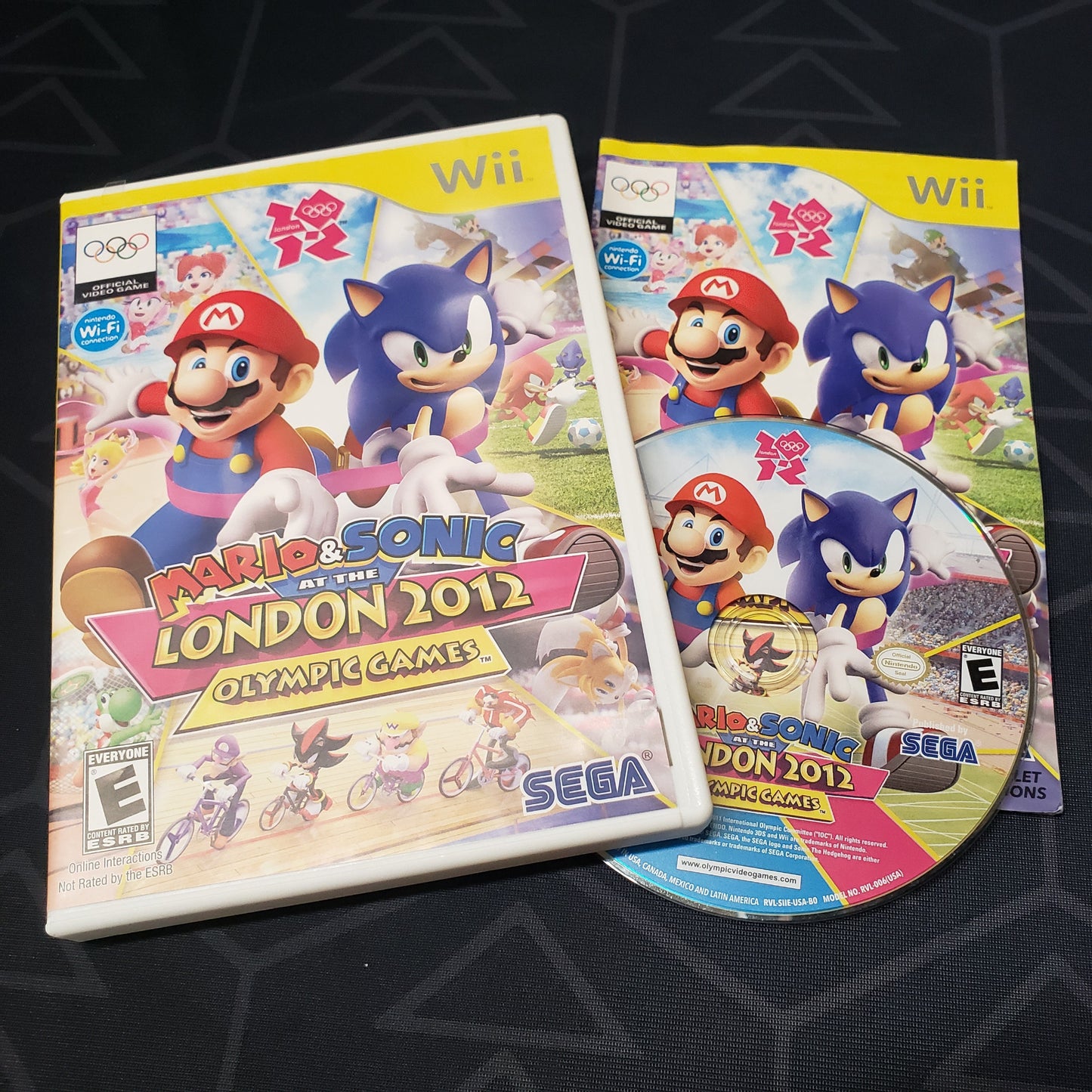 Image shows the case, manual & disc for the video game Mario & Sonic at the London 2012 Olympic Games for Nintendo Wii