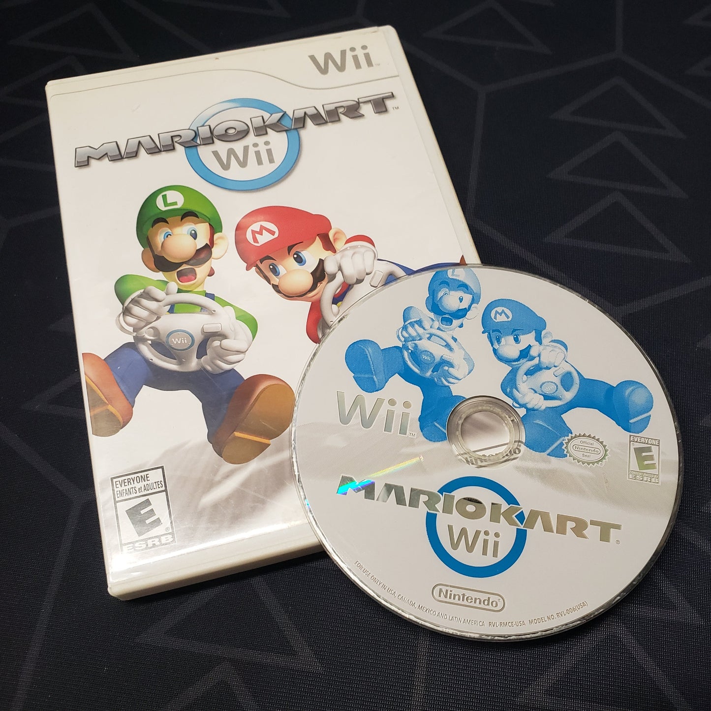 Image shows the case & disc for the video game Mario Kart Wii for Nintendo Wii