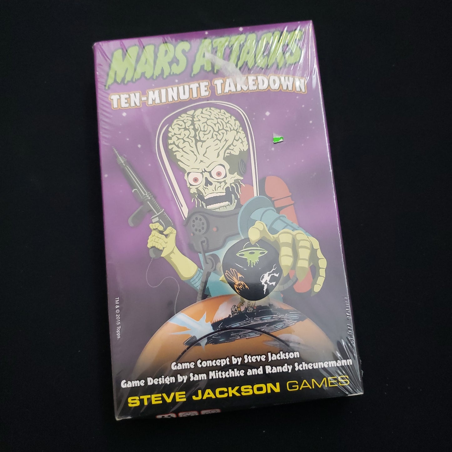 Image shows the front cover of the box of the Mars Attacks: ten-Minute Takedown board game