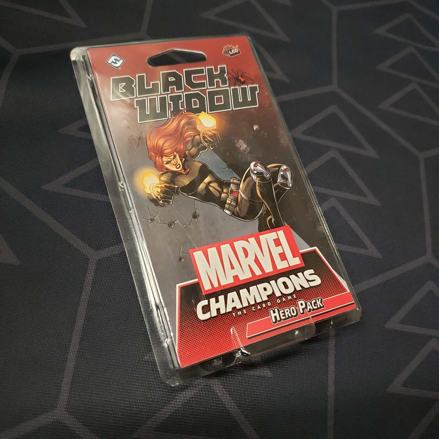 Image shows the front of the package for the Black Widow Hero Pack for the Marvel Champions card game