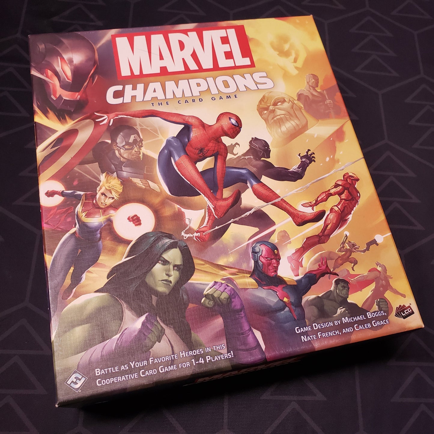 Image shows the front cover of the box of Marvel Champions: The Card Game