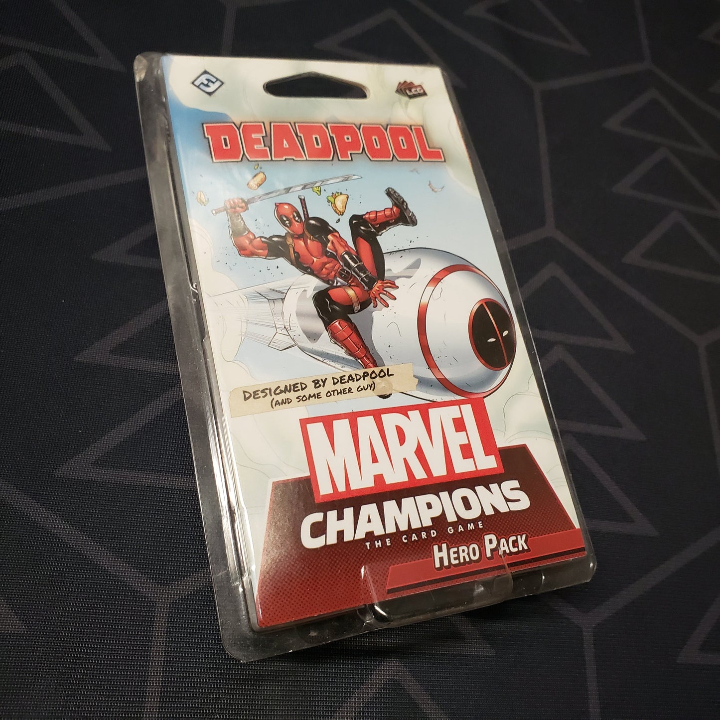 Image shows the front of the package for the Deadpool Expanded Hero Pack for the Marvel Champions card game