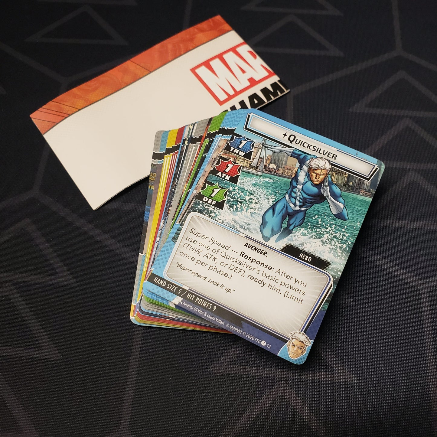 Image shows the cards fanned-out in a stack for the Quicksilver Hero Pack from the Marvel Champions card game
