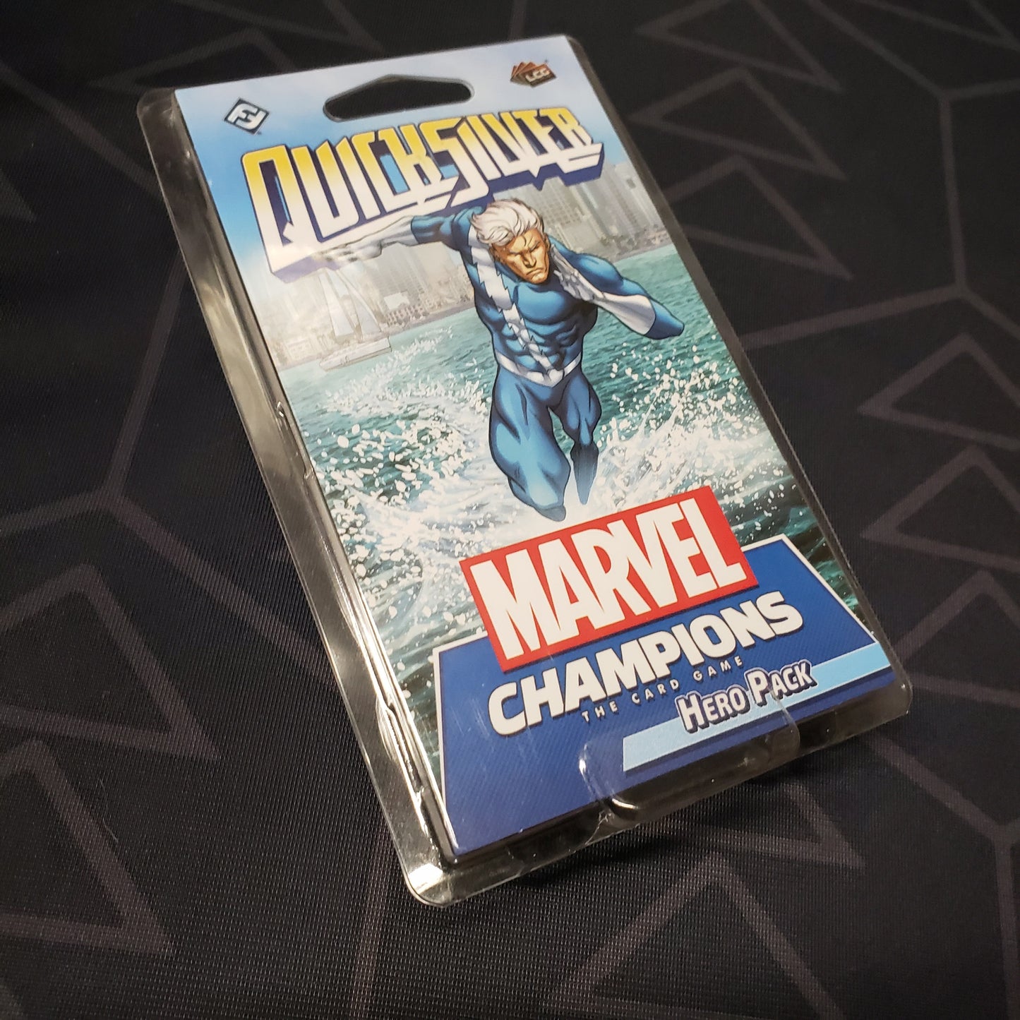 Image shows the front of the package for the Quicksilver Hero Pack for the Marvel Champions card game