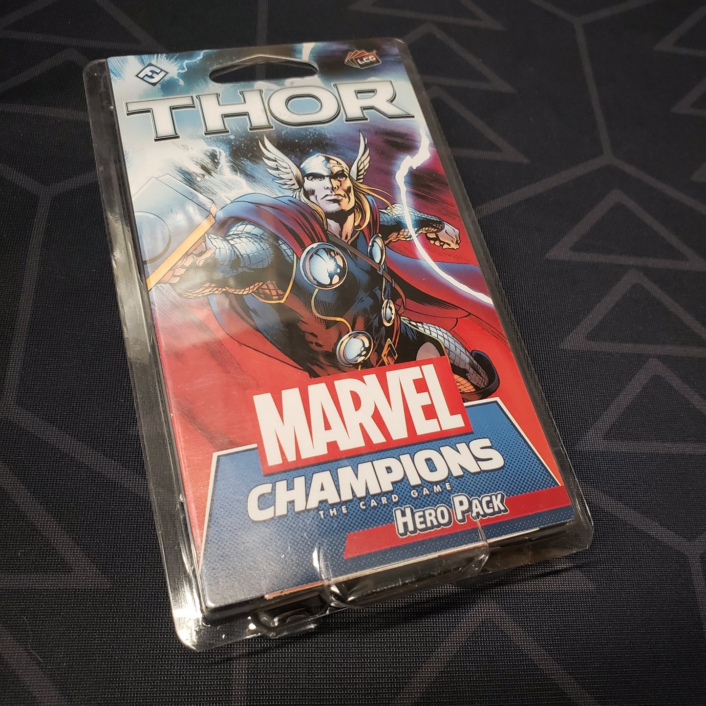 Image shows the front of the package for the Thor Hero Pack from the Marvel Champions card game