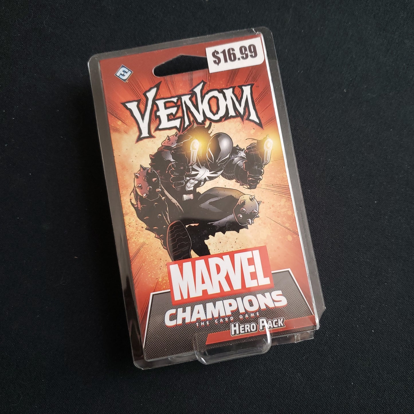 Image shows the front of the package for the Venom Hero Pack for the Marvel Champions card game