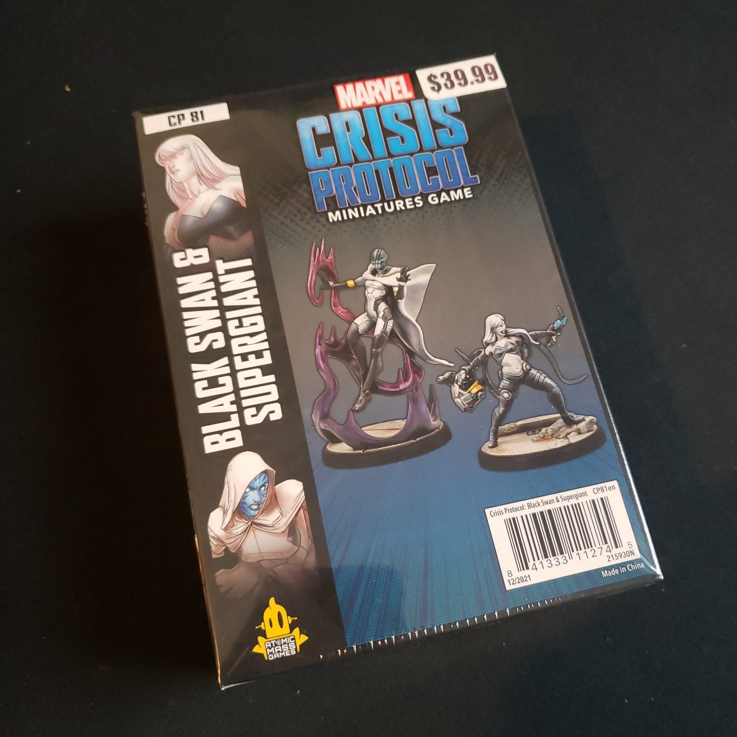 Image shows the front of the package for the Black Swan & Supergiant character pack for the Marvel Crisis Protocol miniatures game