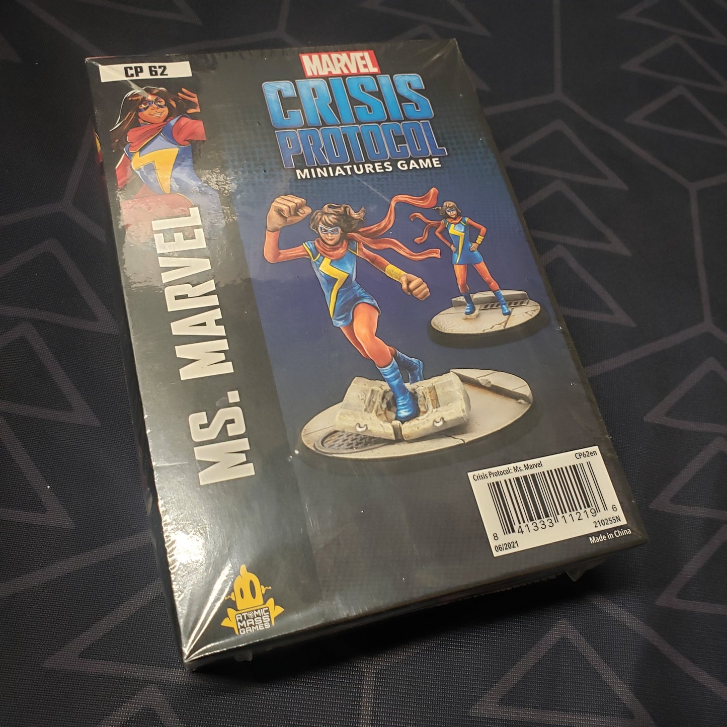 Image shows the front of the package for the Ms. Marvel character pack for the Marvel Crisis Protocol miniatures game