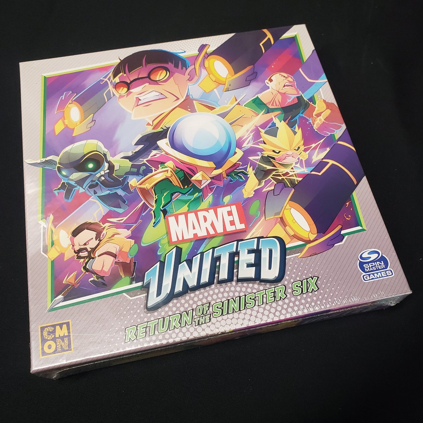 Image shows the front cover of the box for the Return of the Sinister Six expansion for the board game Marvel United