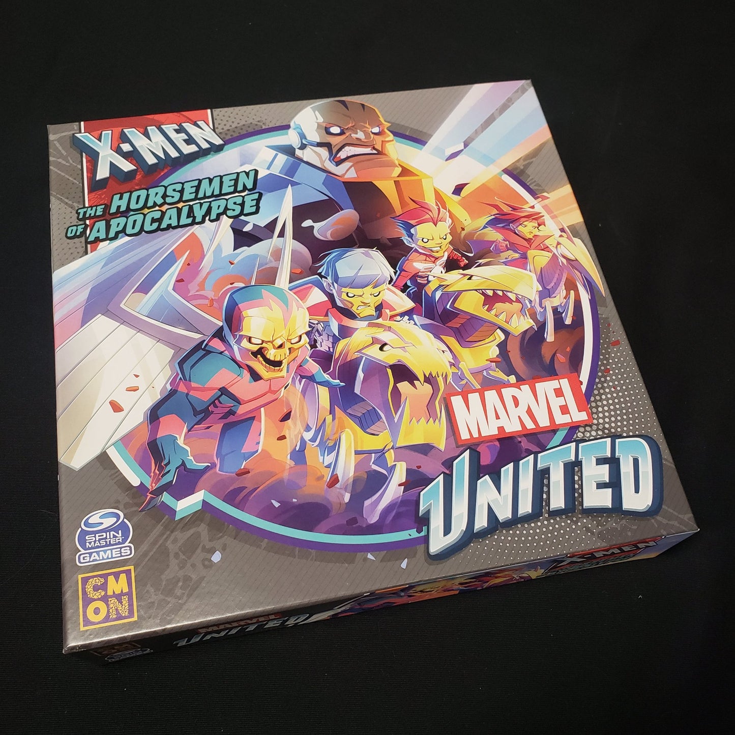 Image shows the front cover of the box for the Horsemen of Apocalypse expansion for the board game Marvel United