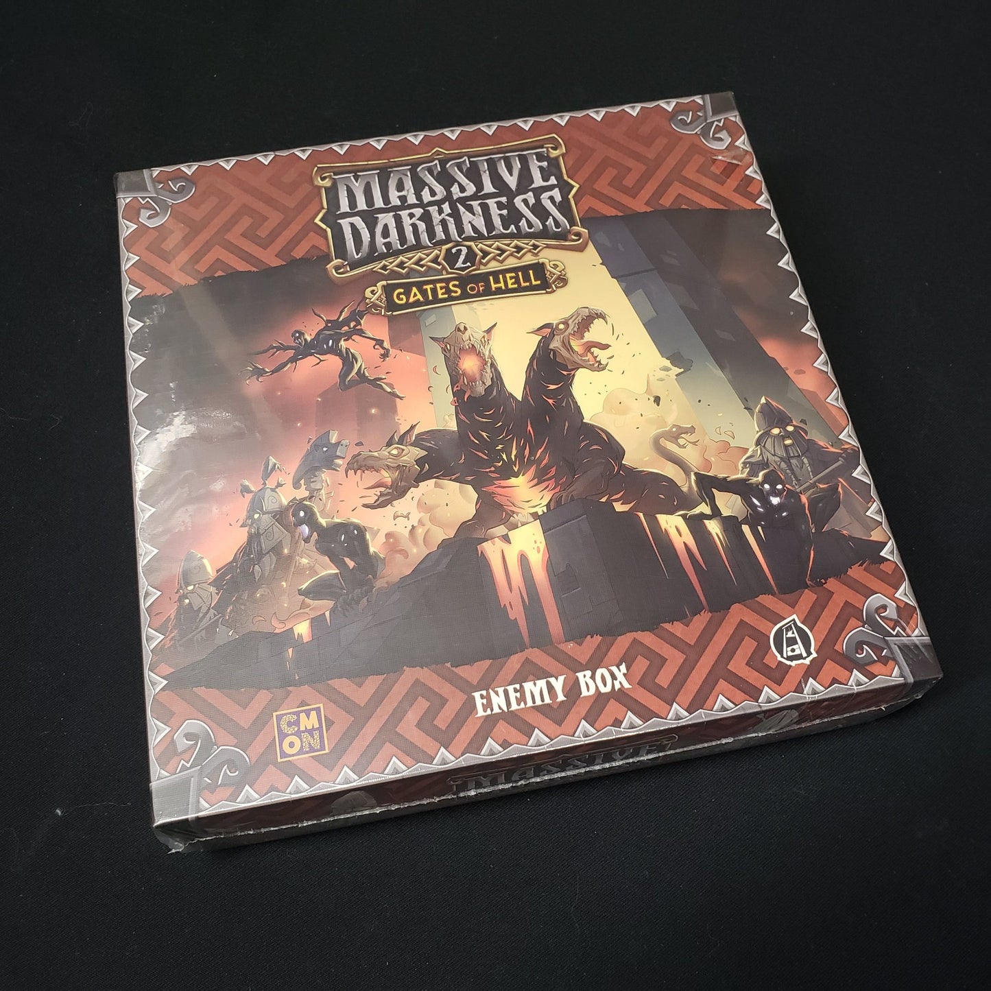 Image shows the front cover of the box of the Gates of Hell Enemy Box expansion for the board game Massive Darkness 2: Hellscape