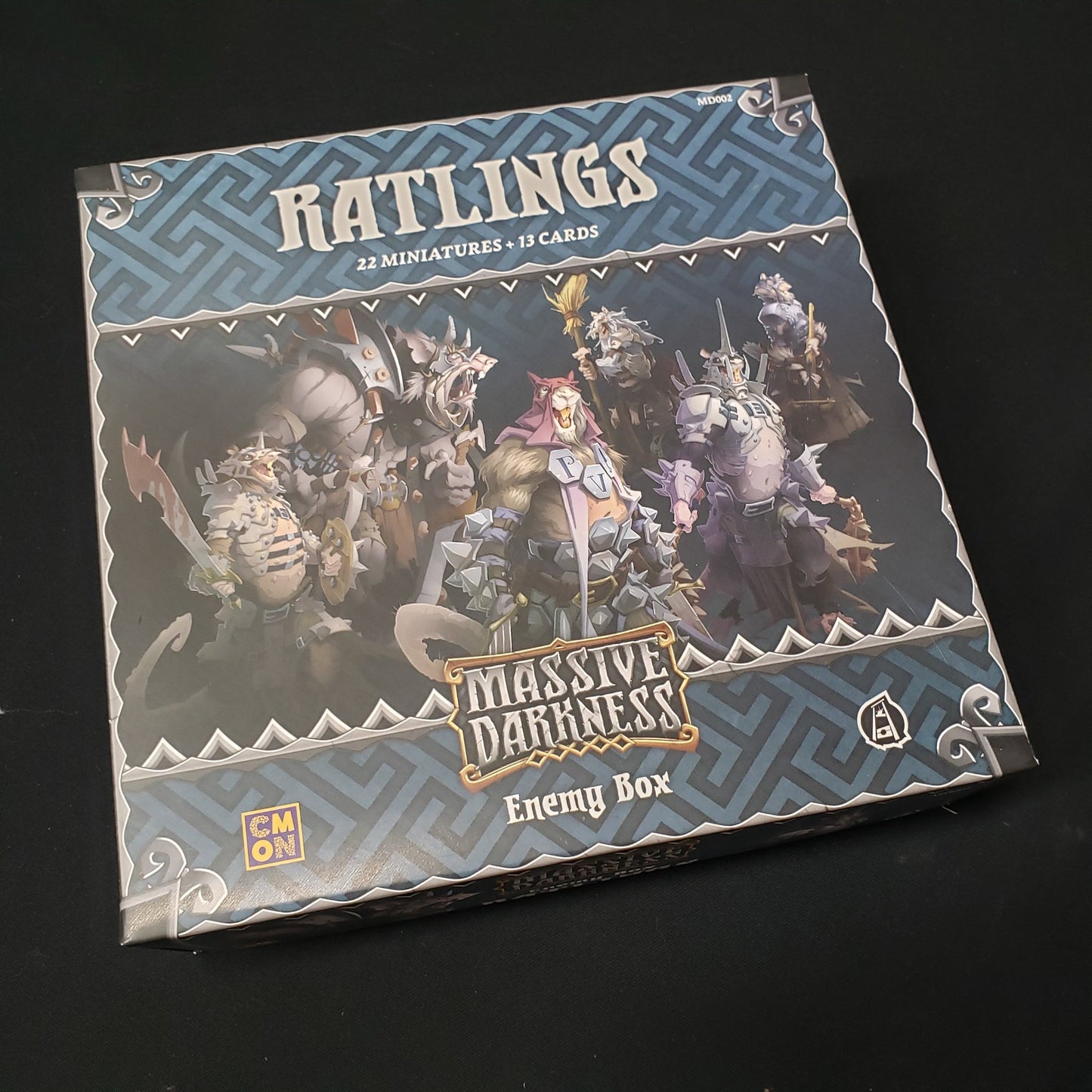 Image shows the front cover of the box of the Ratlings Enemy Box expansion for the board game Massive Darkness