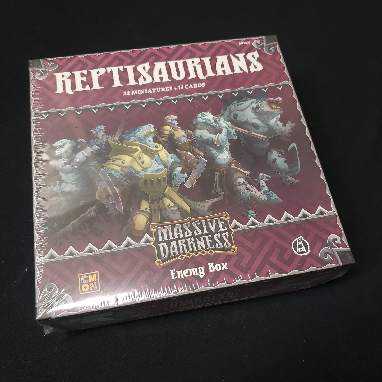 Image shows the front cover of the box of the Reptisaurians Enemy box expansion for the board game Massive Darkness
