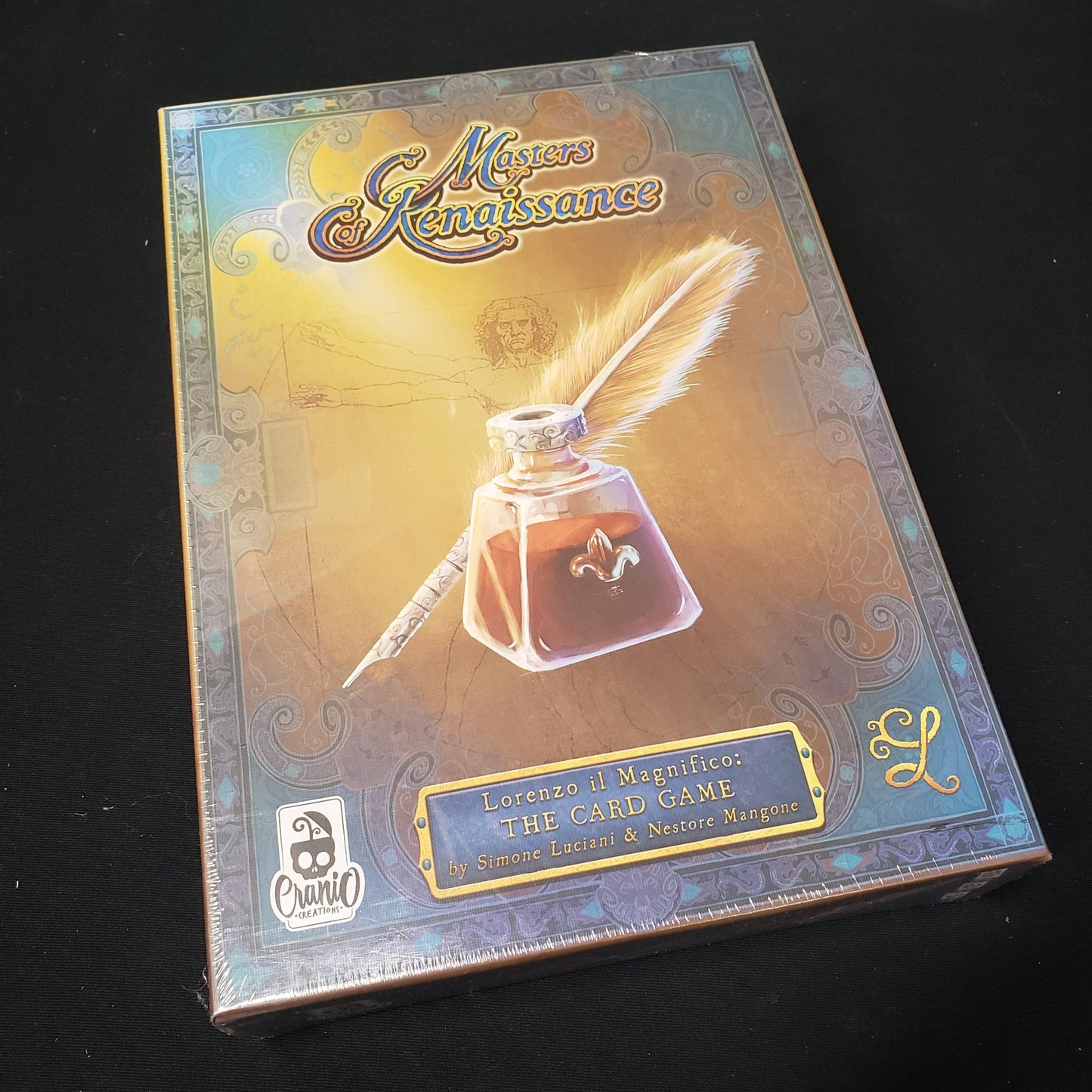 Image shows the front cover of the box of the Masters of Renaissance card game