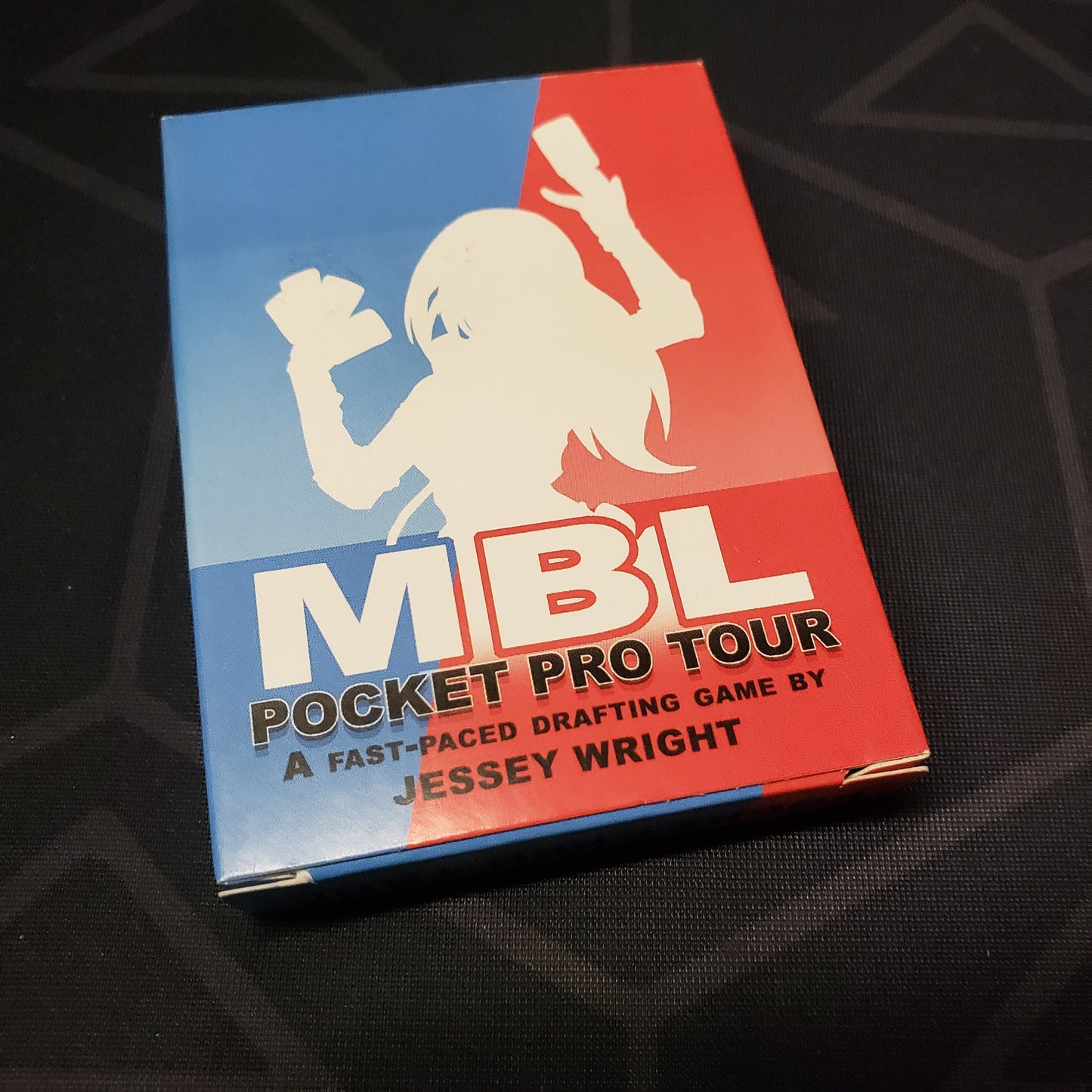 Image shows the front cover of the box for the MBL Pocket Pro Tour card game