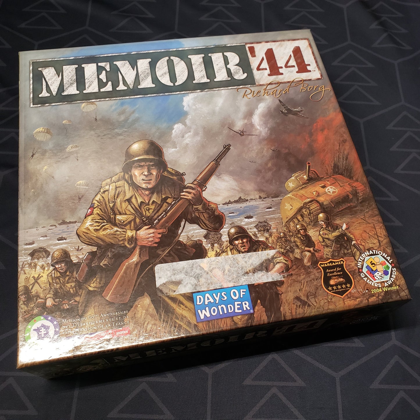 Image shows the front cover of the box of the Memoir 44 board game