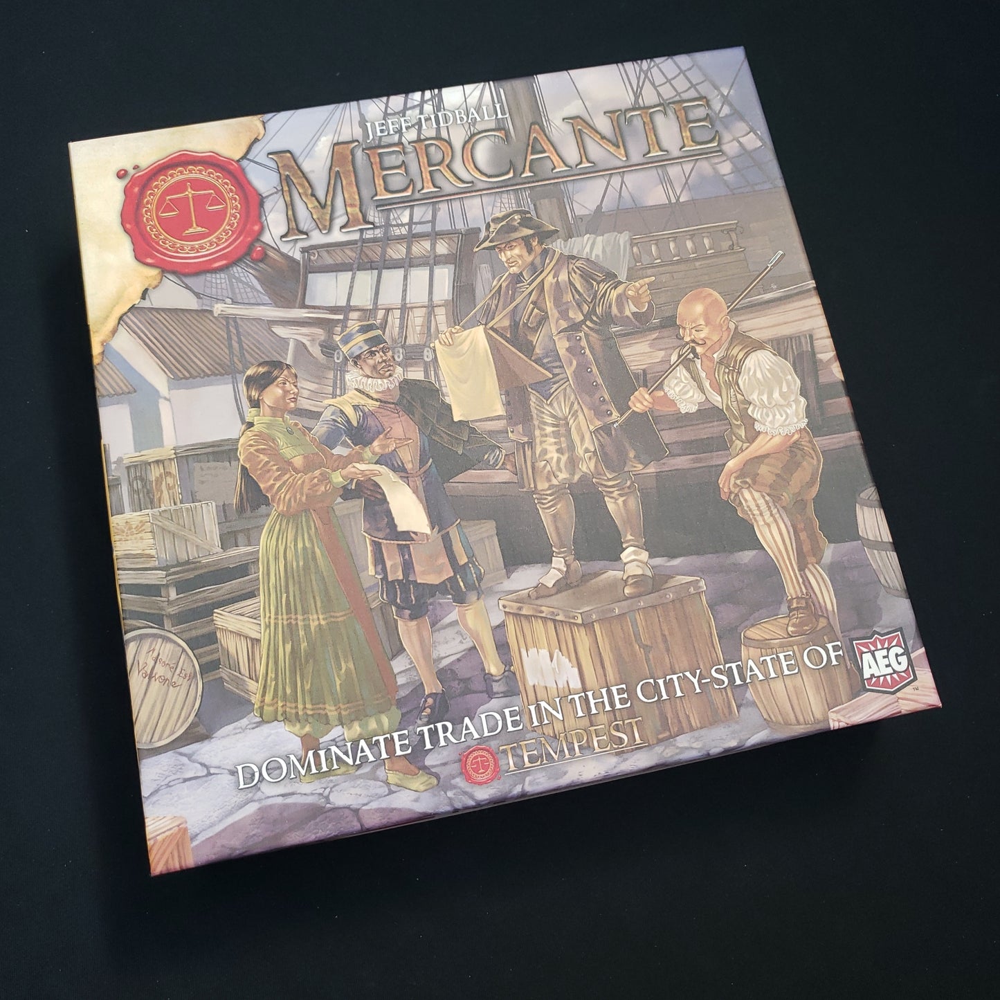 Image shows the front cover of the box of the Mercante board game