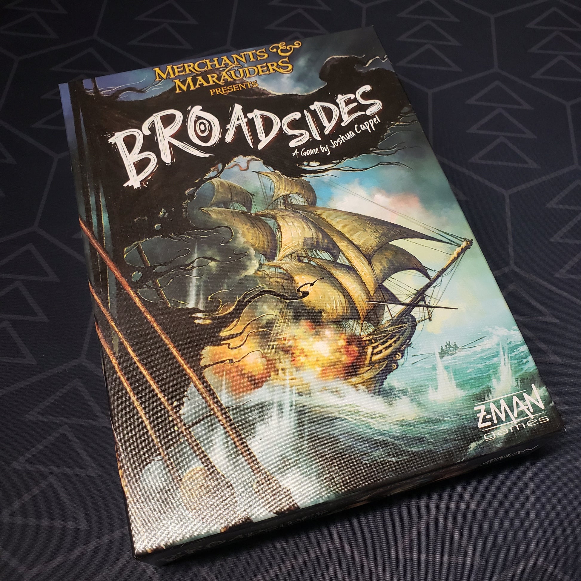 Image shows the front cover of the box of the Merchants & Marauders: Broadsides board game