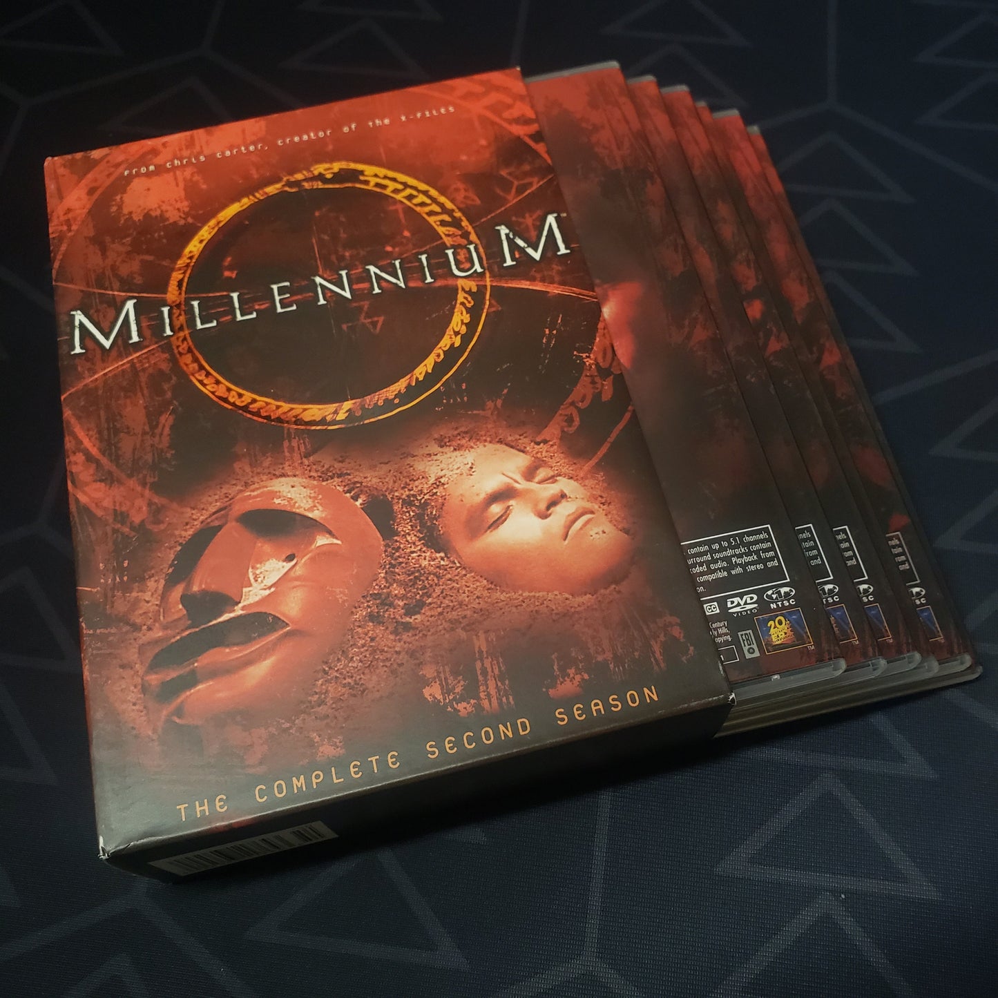 Image shows the outer box with the disc cases fanned out for Millennium: Season 2 on DVD