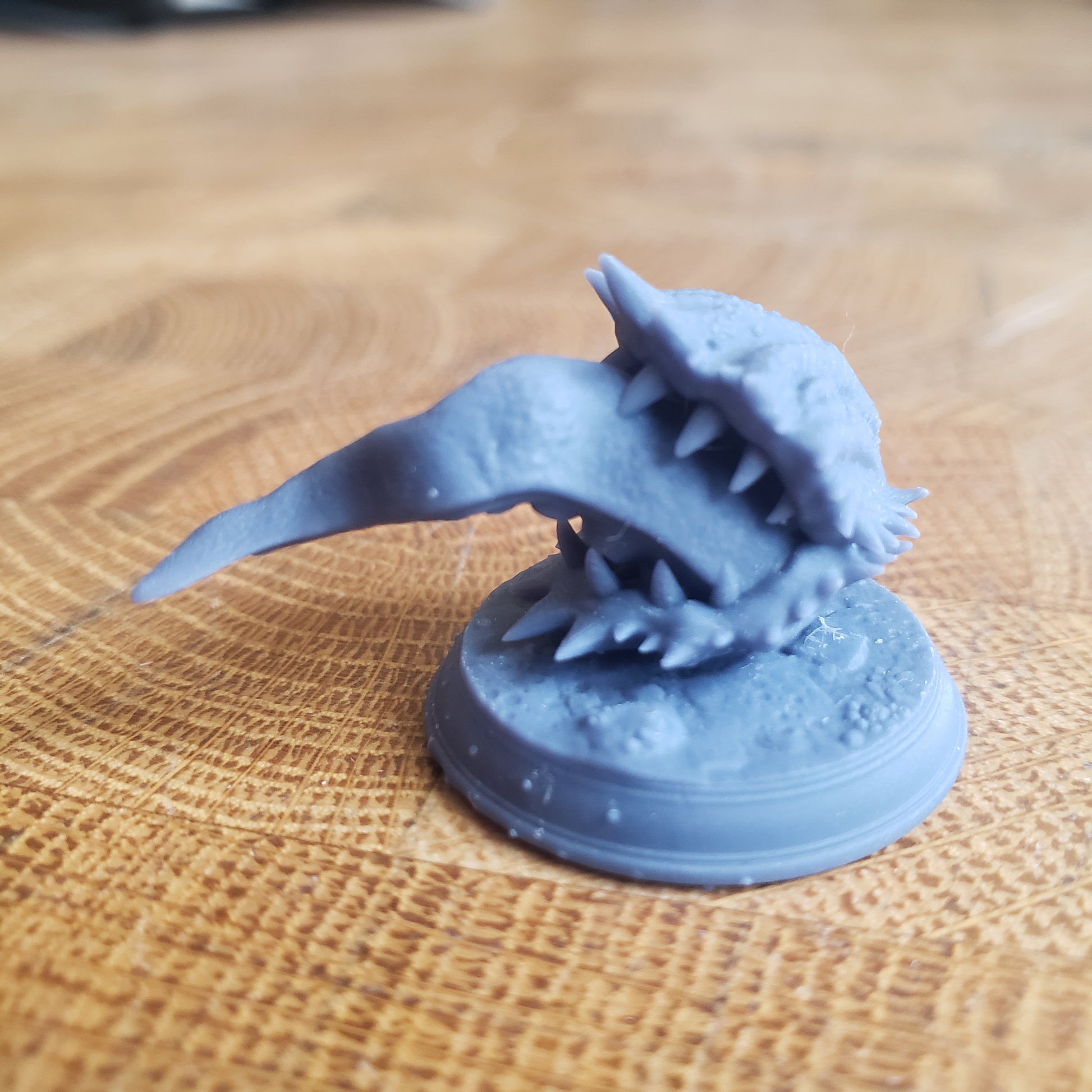 Image is a photo of a 3D printed attacking clam mimic gaming miniature printed in-house at All Systems Go