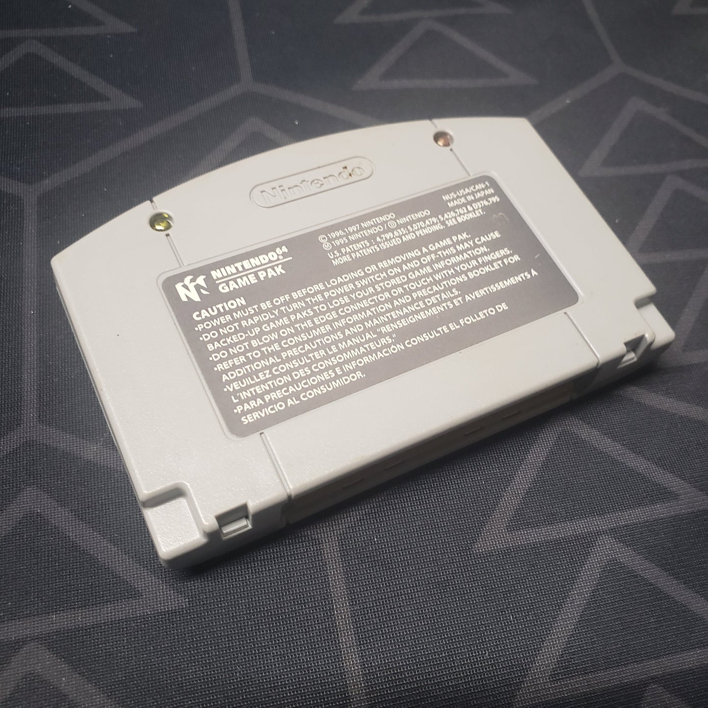 Image shows the back of the cartridge for the video game Mischief Makers for the Nintendo 64