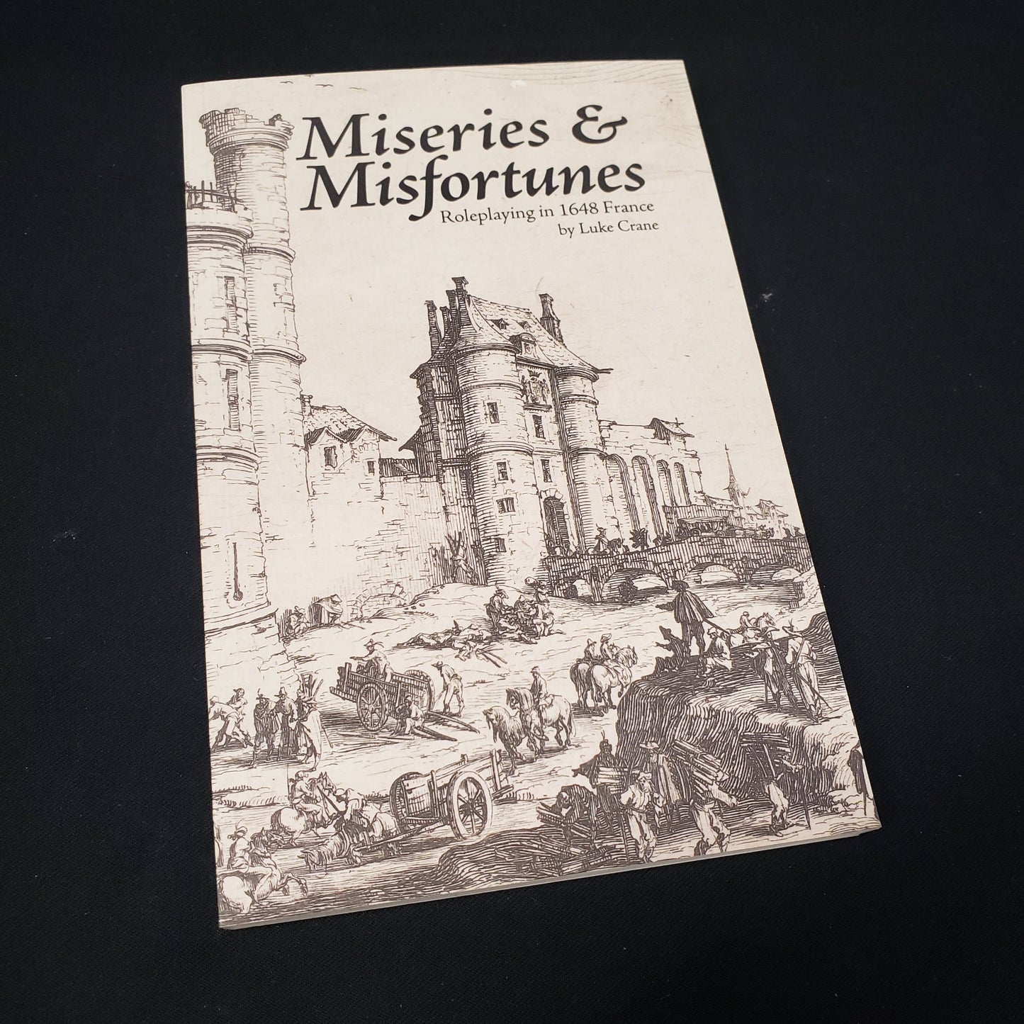 Image shows the front cover of the Miseries & Misfortunes: Roleplaying in 1648 France roleplaying game book