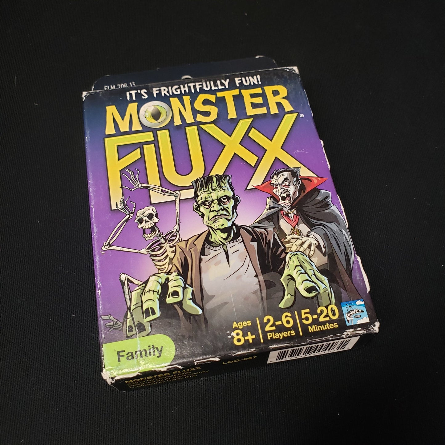 Image shows the front cover of the box of the Monster Fluxx card game
