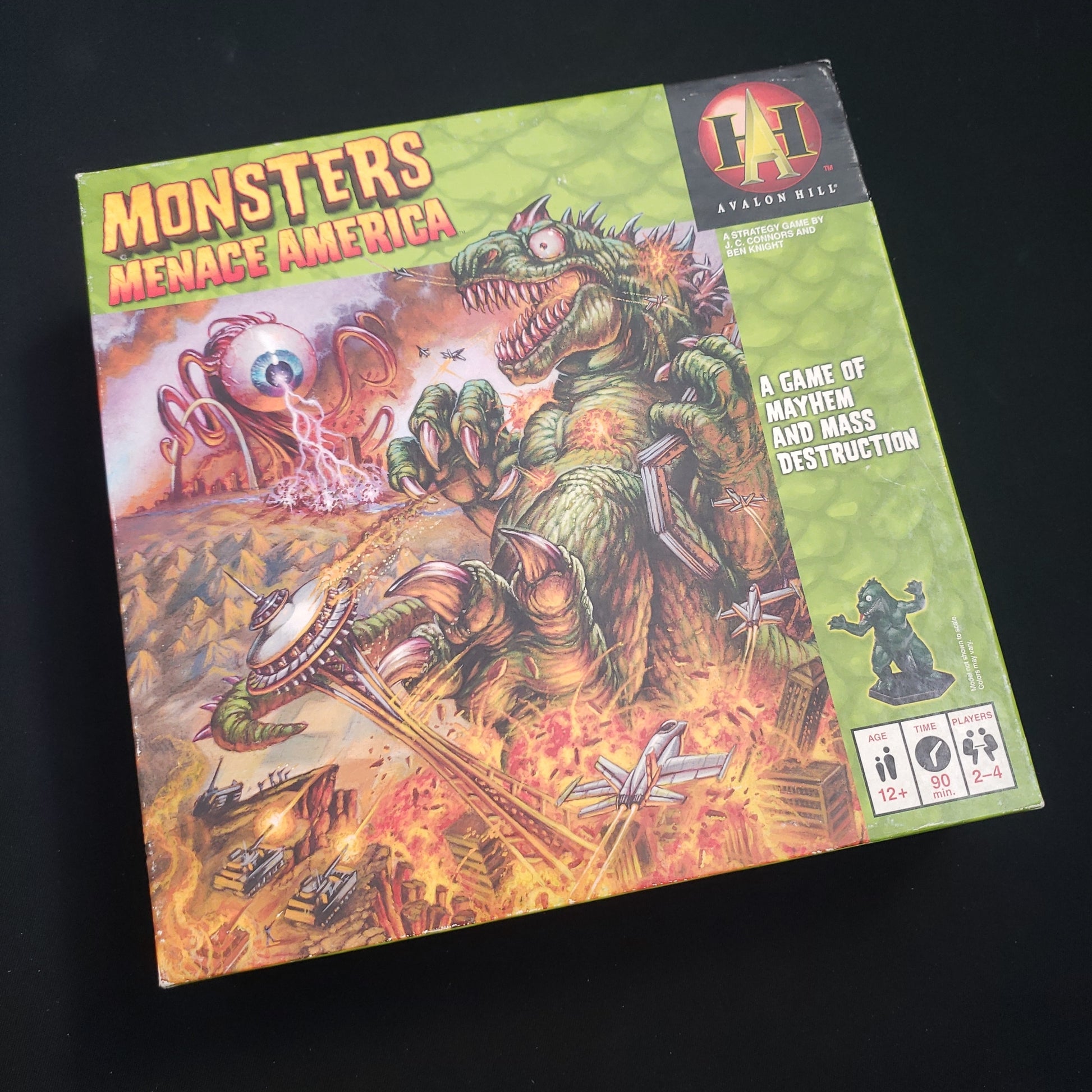 Image shows the front cover of the box of the Monsters Menace America board game