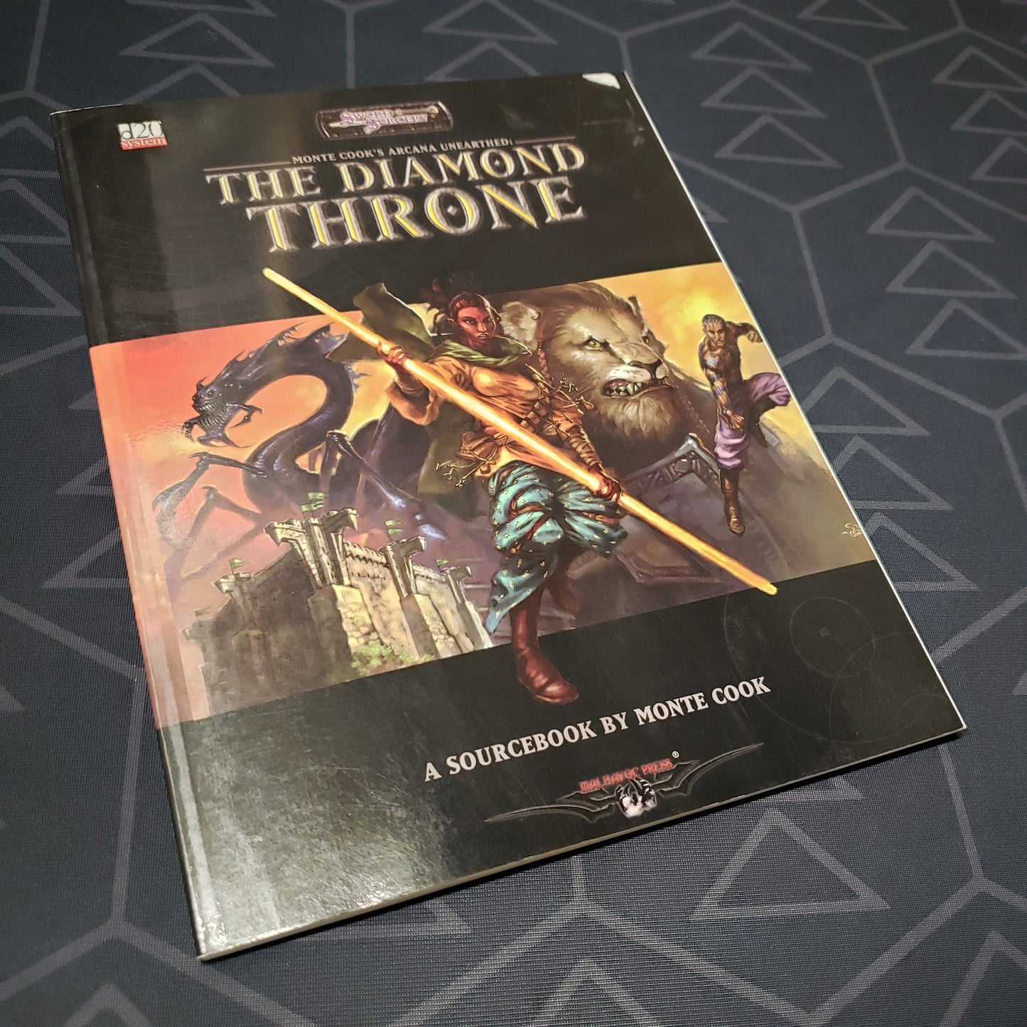 Image shows the front cover of the Arcana Unearthed: The Diamond Throne roleplaying game book