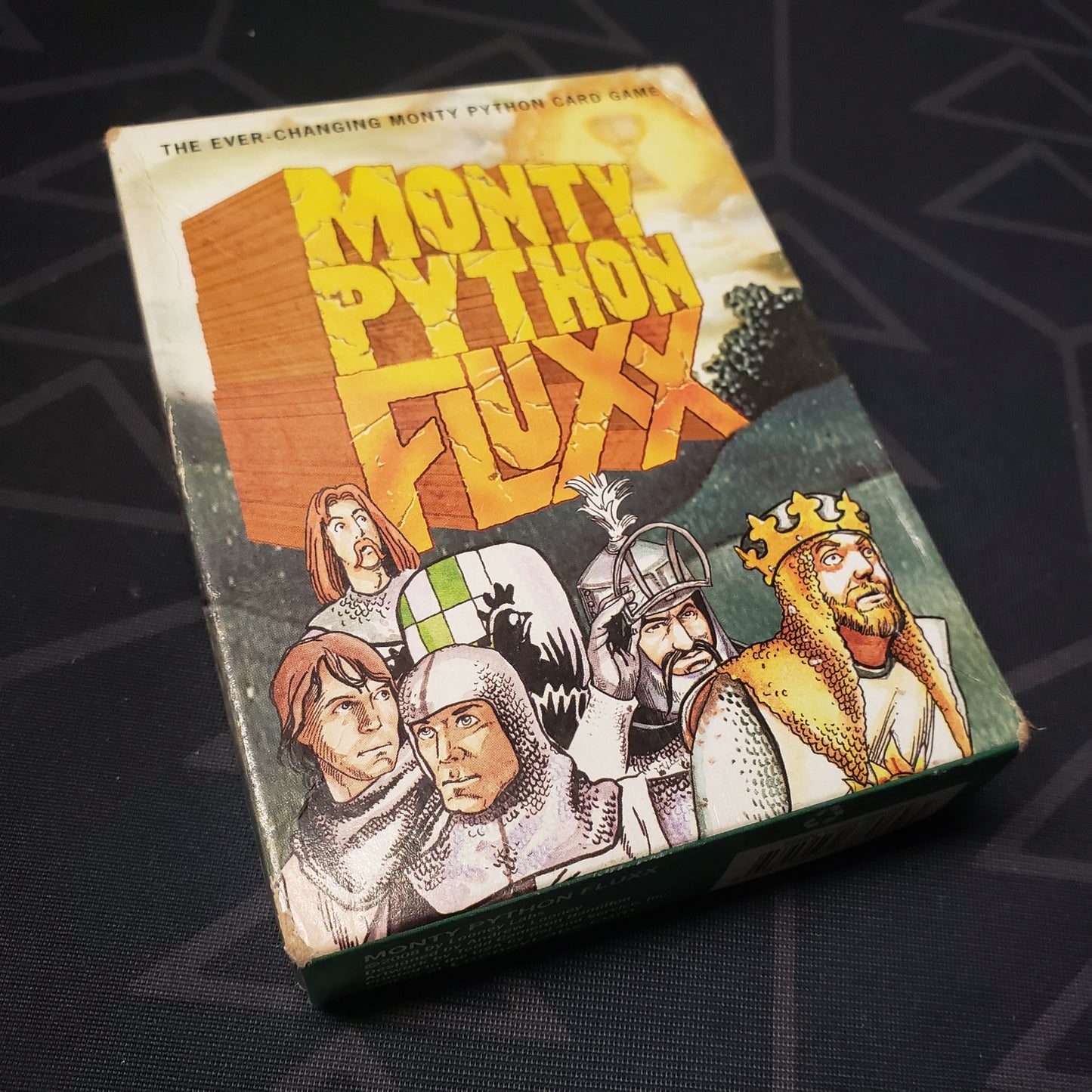 Image shows the front cover of the box of the Monty Python Fluxx card game