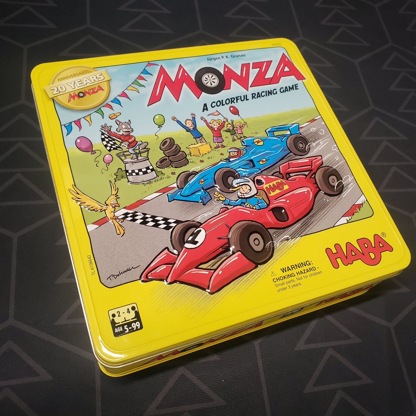 Image shows the front cover of the box for the Monza: 20th Anniversary board game