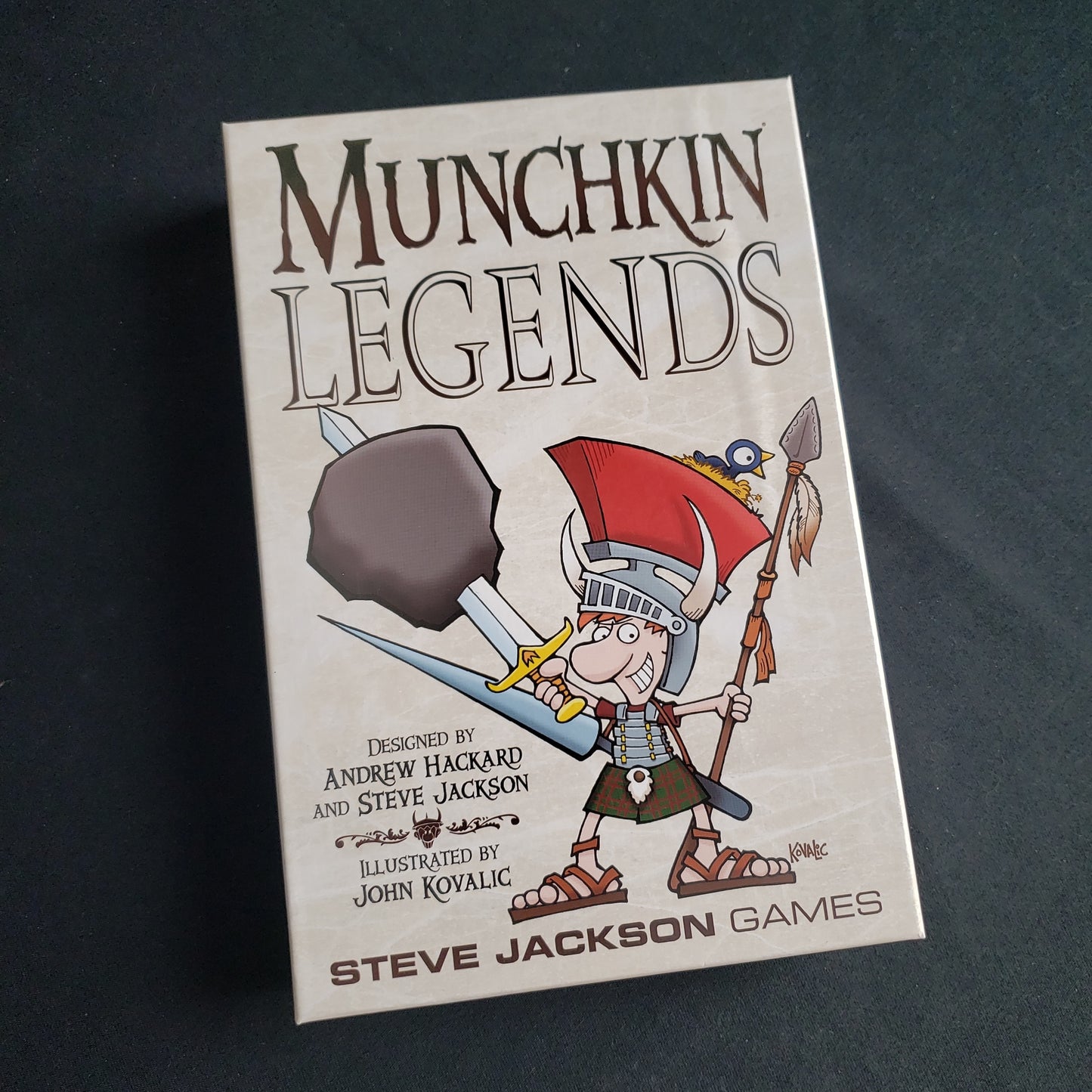 Image shows the front cover of the box of the Munchkin Legends card game