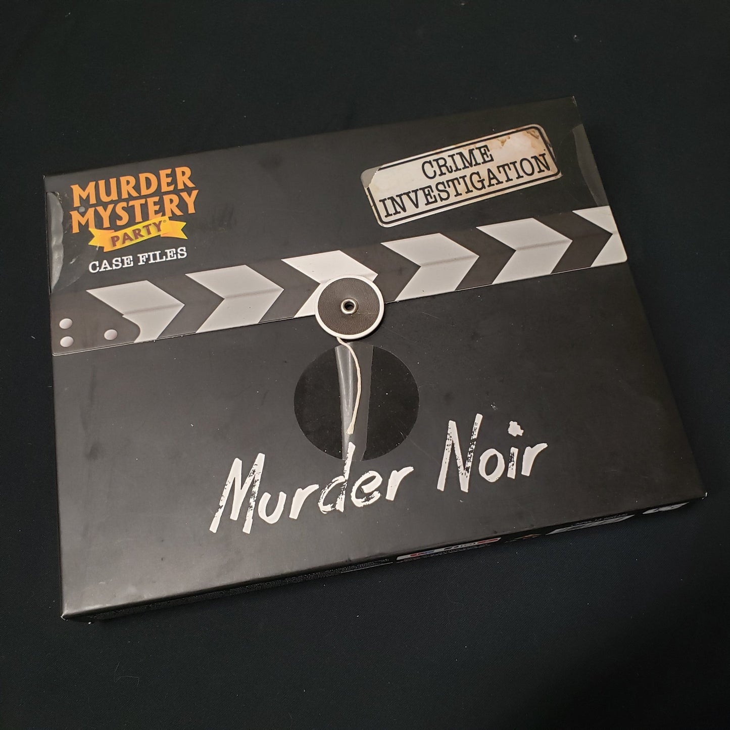 Image shows the front cover of the box of the Murder Mystery Party Case Files: Murder Noir game