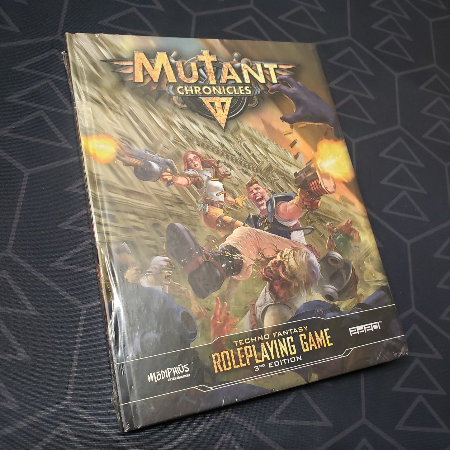 Image shows the front cover of the core rulebook for the roleplaying game Mutant Chronicles 3E