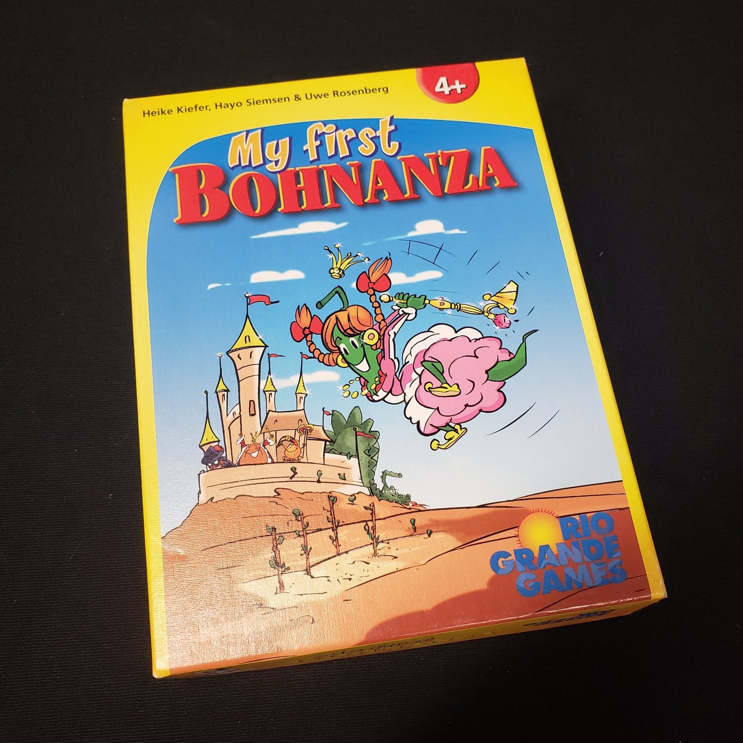 Image shows the front cover of the box of the My First Bohnanza card game