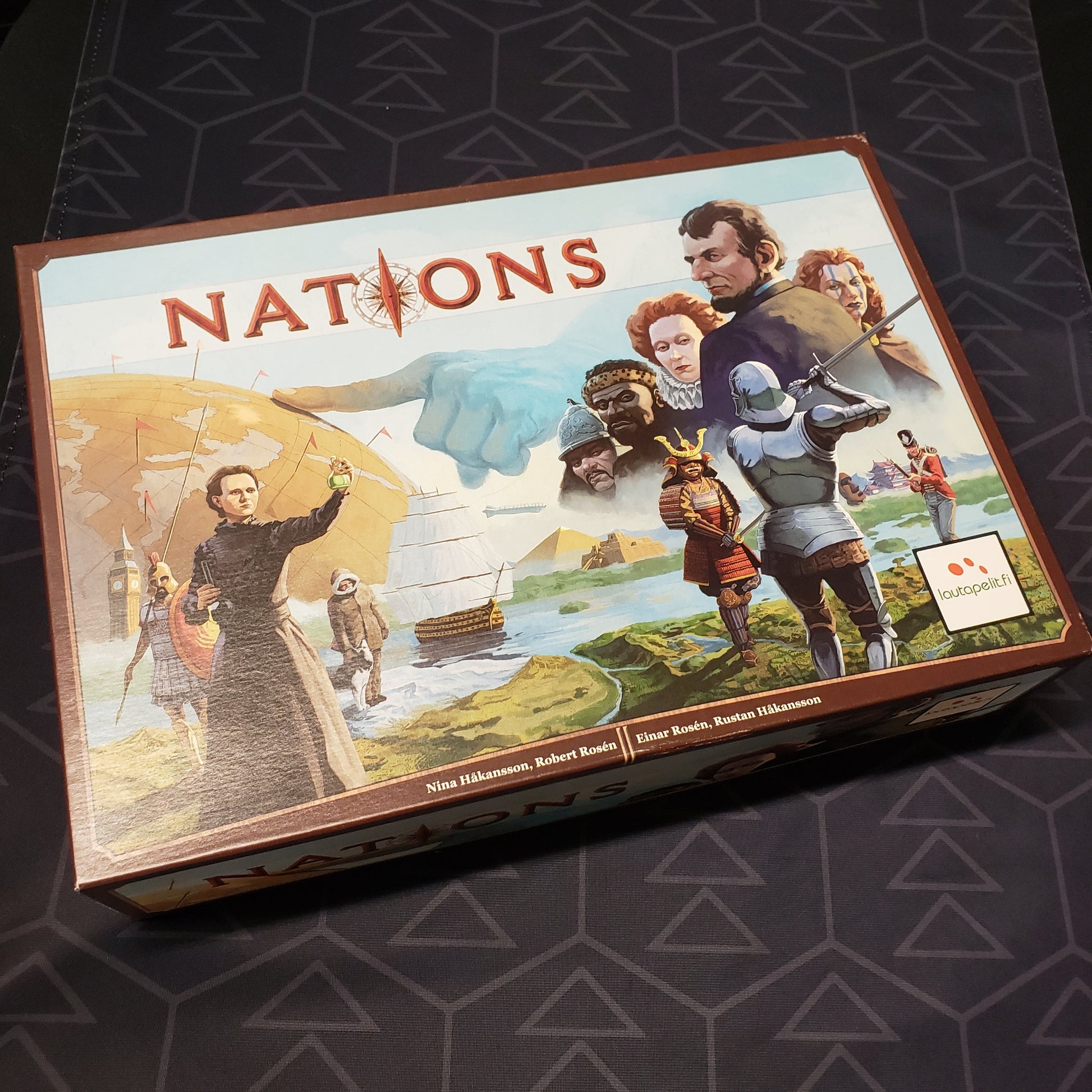 Image shows the front cover of the box for the Nations board game