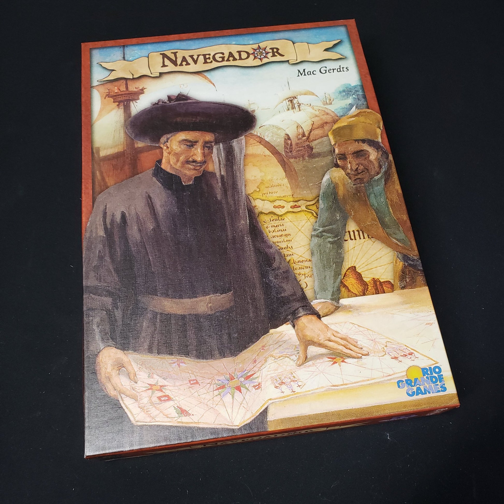Image shows the front cover of the box of the Navegador board game
