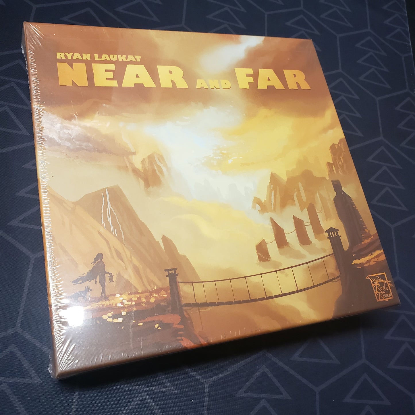 Image shows the front cover of the box of the Near and Far board game
