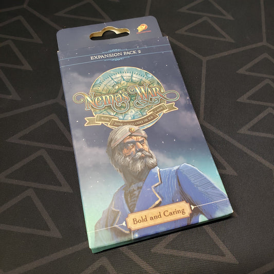 Image shows the front cover of the box of the Bold and Caring expansion for the board game Nemo's War