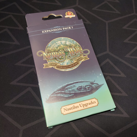 Image shows the front cover of the package of the Nautilus Upgrades expansion for the board game Nemo's War