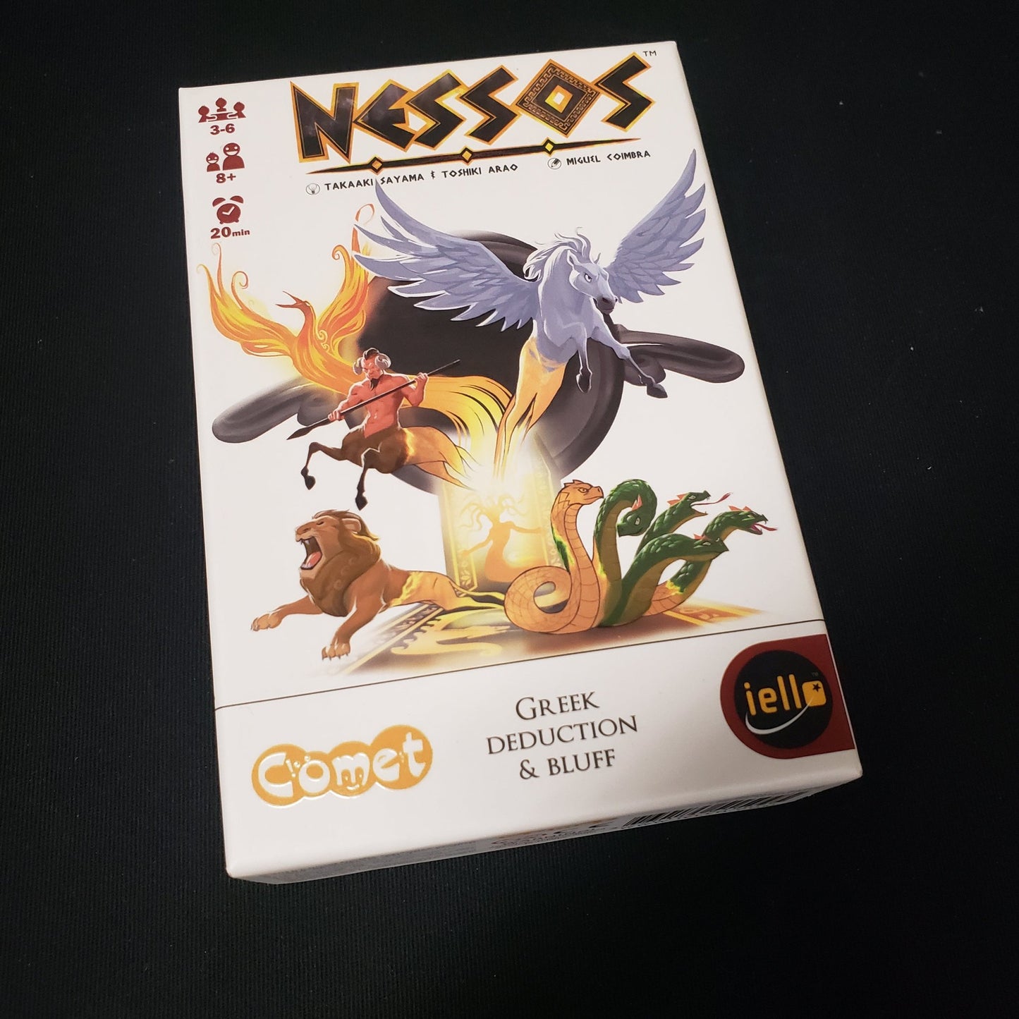 Image shows the front cover of the box of the Nessos card game