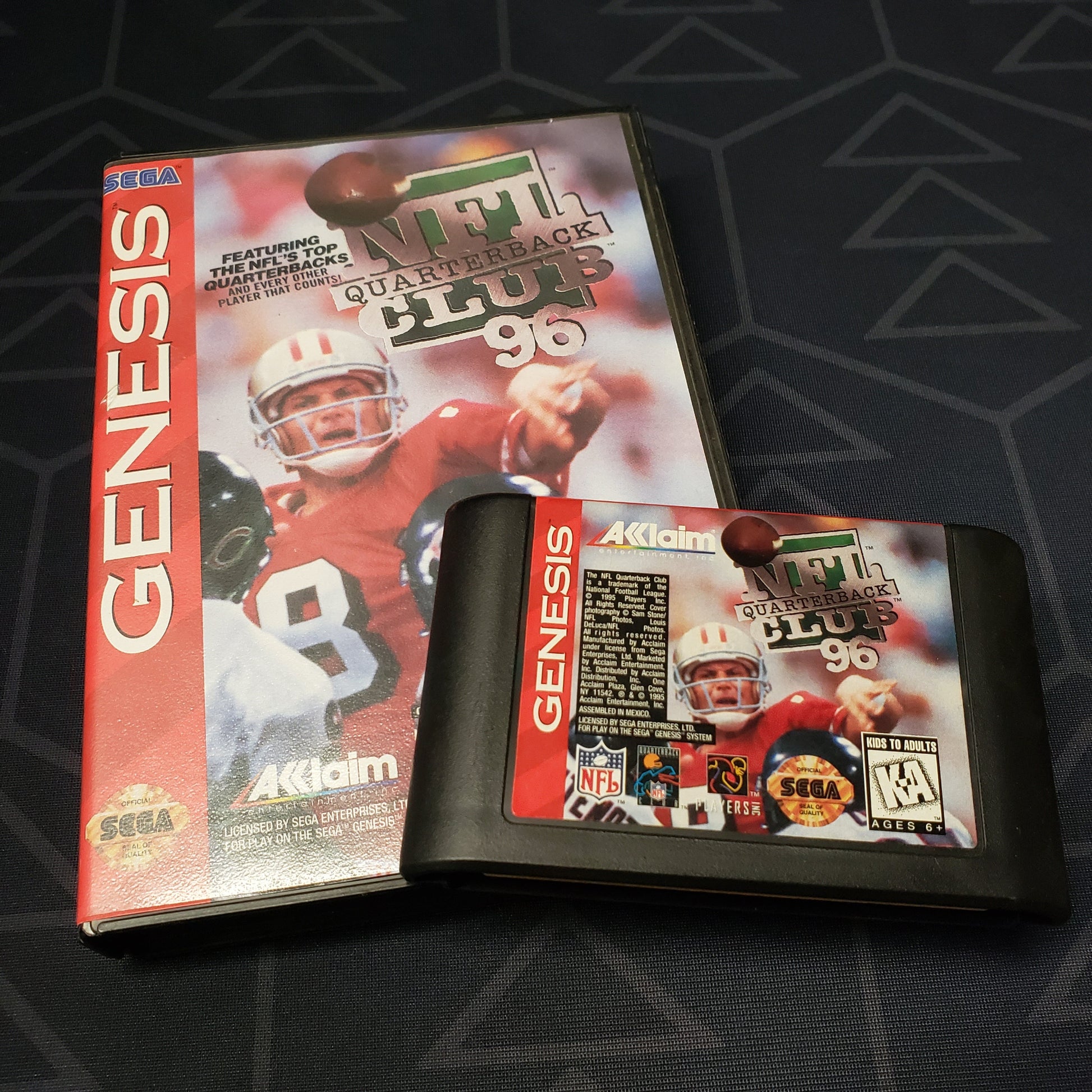 Image shows the case & cartridge for the video game NFL Quarterback Club ā96 for Sega Genesis