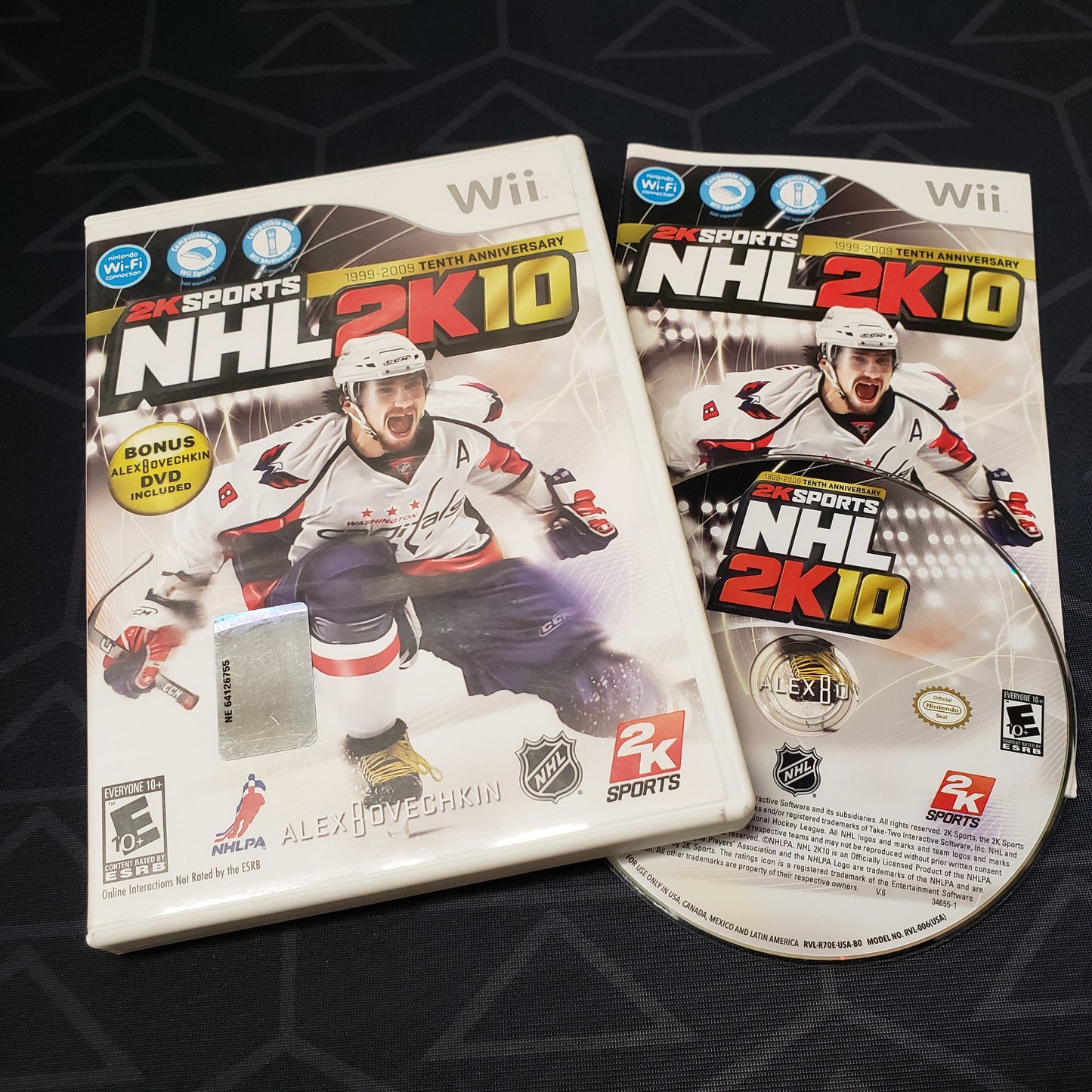 Image shows the case, manual & disc for the video game NHL 2K10 for Nintendo Wii